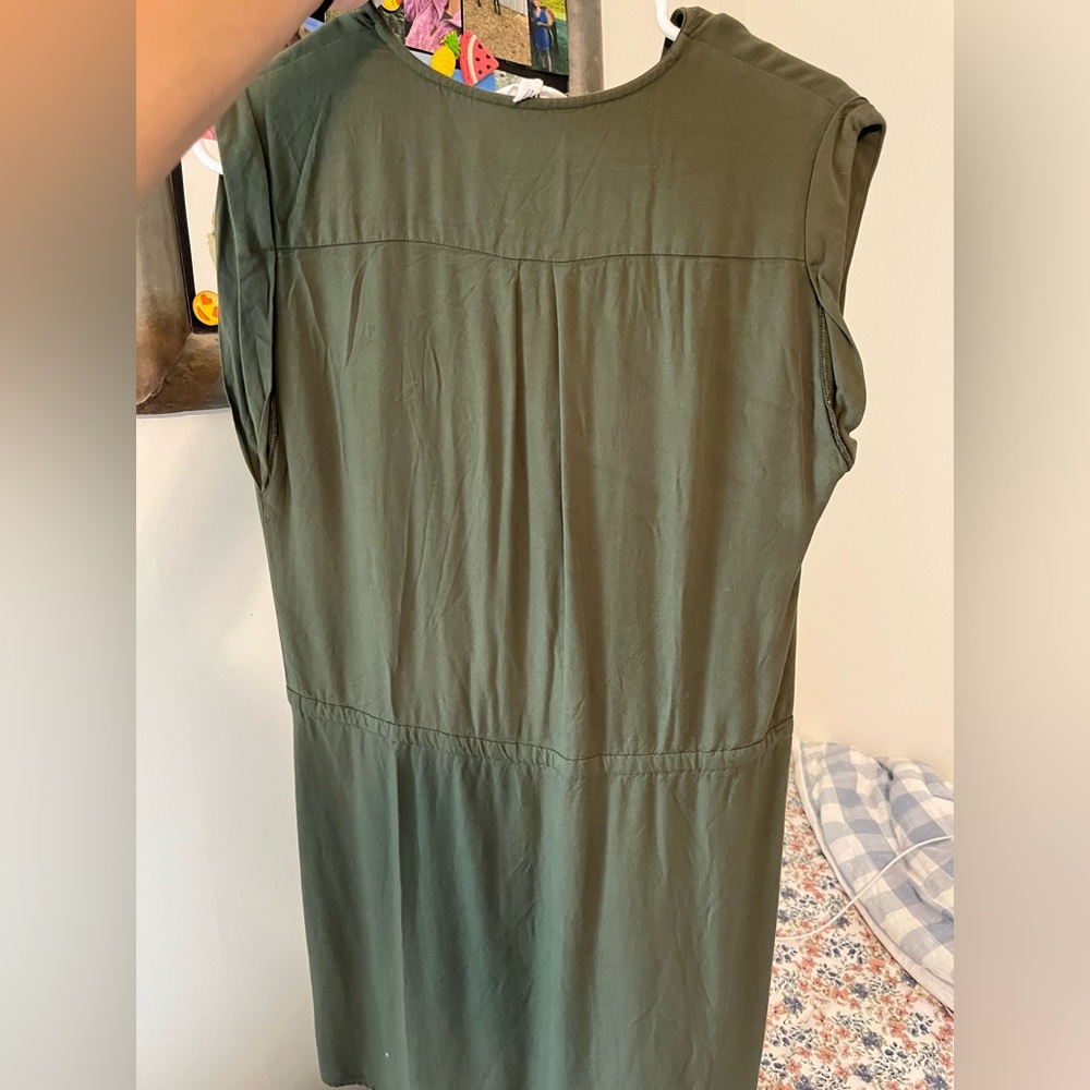 Woman’s olive green dress